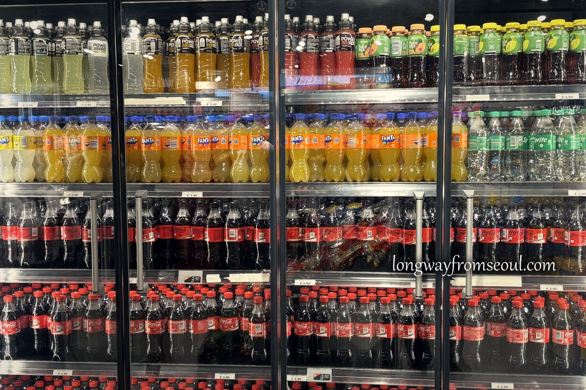 A wall of chilled drinks inside an Italian Autogrill service station